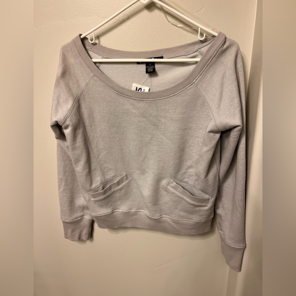Light gray semi crop top sweatshirt. Never worn. Still has tags